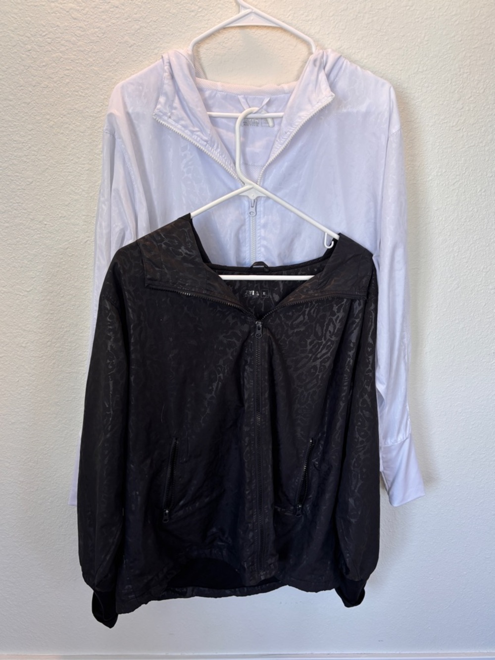 Bundle of 2. Zyia Active Black and White Windbreaker Zip-Up Hoodie